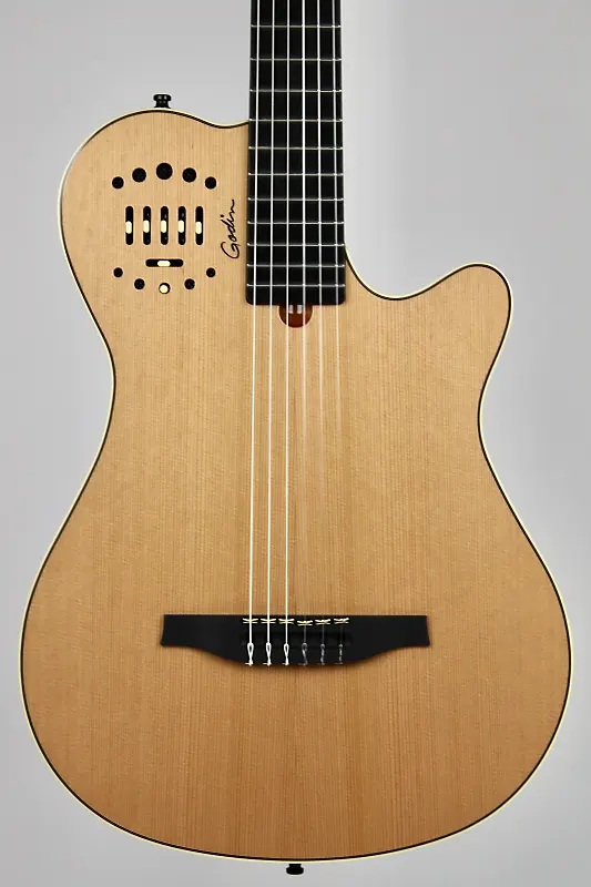 Guitarra GODIN MultiAc Grand Concert Deluxe Natural C/Gig Bag Canada DUMPELL